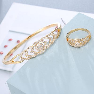 China High Quality Jewelry Set Stain Zircon Inlaid Temperament Brass Plating Lady's Gold Bracelet Geometric Ring Set for sale