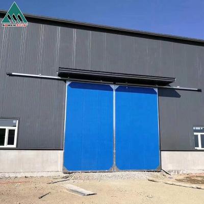 China Best price automatic or manual garage slide heat insulation industrial steel door for sale