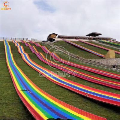 China Amusement Park Snow Slide Large Outdoor Custom Playground Plastic Rainbow Dry Slide In Ground Hill Slope Amusement Park for sale