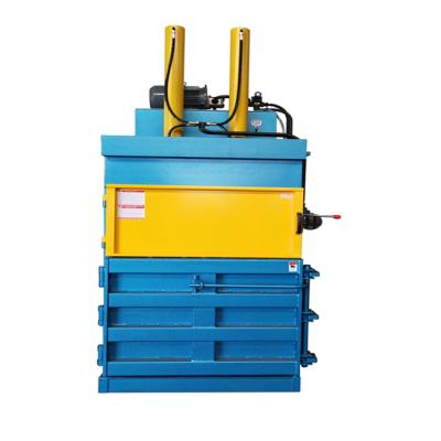 China Vertical Beverage Packing Pressing Machine Used Garment Wrapping Machine Waste Paper Wrapping Machine for sale