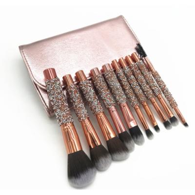 China Angular Blush 10pcs Crystal Synthetic Fiber Handle Brush Set With Travel Bag for sale