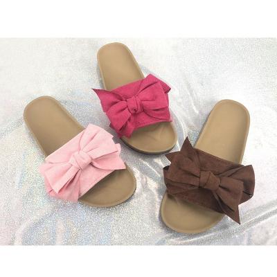 China Lady Comfortable Designer Bowknot Slides Women's Factory Price Fashion Trend Plastic Suede Upper Sandals Running Shoes for sale