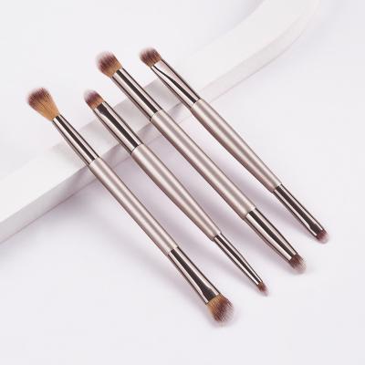 China Angular Blush New Arrival 4pcs Double Ended Eyeshadow Mini Makeup Brushes Angle Brush For Eyebrows Champagne Gold Color for sale