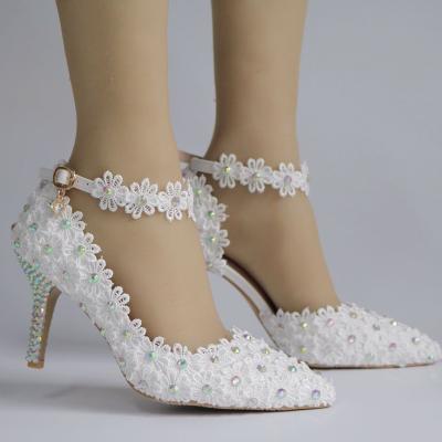 China Crystal Queen White Lace Flower Lightweight Wedding Shoes High Heel Bridal Women Pumps Shallow Pointed Toe for sale