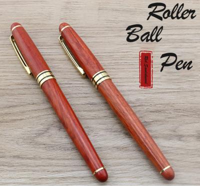 China Red Sandalwood Luxury Roller Ball Pen 0.5mm Business Roller Pen With Gold Accessories for sale