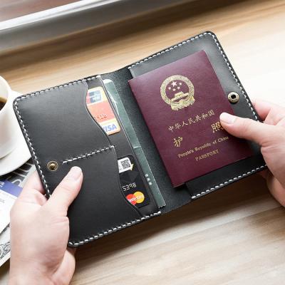 China RFID Blocking Protects RFID Blocking Black Leather Passport Holder Cover PU Gift Passport Promotional Traveling Case for sale