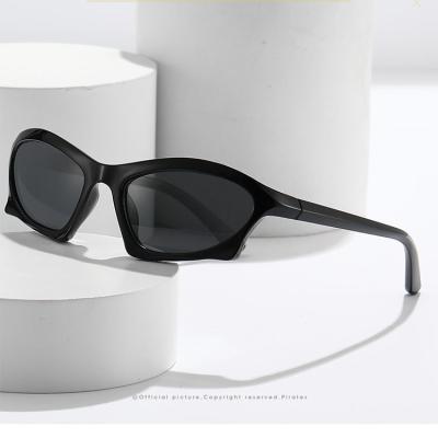 China 2023 New Hot Selling Small Oval Fashionable Sport Shades Ladies Modern Retro Irregular Punk Sunglasses for sale