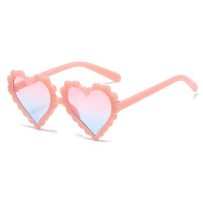 China 2023 New Fashion Sun Glasses Jelly Colors Glitter Heart Shape Girls Children Sunglasses for sale