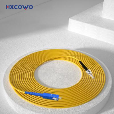 China FTTX Fiber Optic Patch Cord with HXCOWO SC FC Connectors and SM Indoor Armored Cable for sale