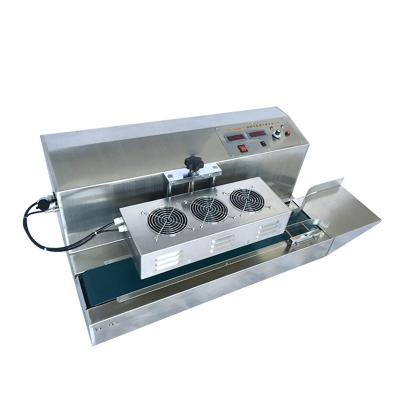 China LX-1500A-II Food Stainless Steel Case Bottle Capper Induction Sealing Machine for sale