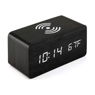 China Modern Wooden Clock Bluetooth LED Digital Pendulum Electric Clock Wireless Charging Creative Wooden Alarm for sale