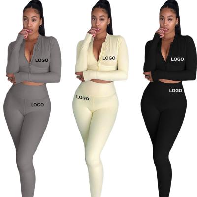 China QUICK DRY Custom Logo Female Solid Color Long Sleeves Two Piece Joggers Wear To Zip Lean High Crop Top Waist Sustainable Gym Equipment for sale