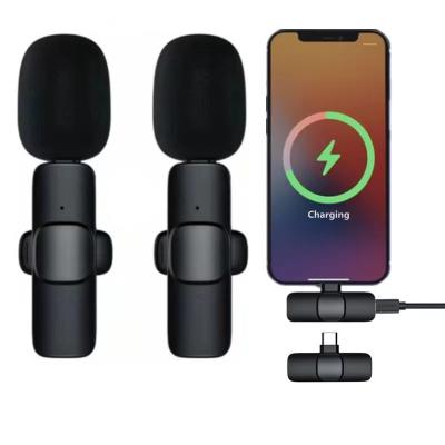 China Plug and Play Hot Sale K9 Two Transmitters Wireless Lapel Microphone for Smartphone Video Recording Live Show Interview YouTube Rechargeable for sale