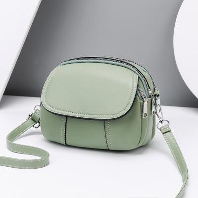 China 2021 new high quality PU material button shoulder bag girls shopping wallet wholesale and mobile purse for sale