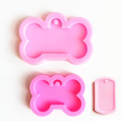 China Viable Hot Sale Glossy Dog Bone Silicone Mold With Key Chain Hole for sale