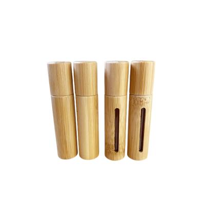 China 10ml Cosmetic Custom Round Bamboo Roller Bottles For Essential Oils for sale