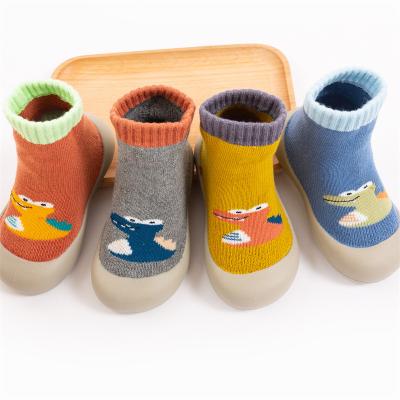 China New Autumn Winter Baby Boys Girls Lightweight Dinosaur Infant Soft Rubber Sole Terry Lined Sock Shoes Cartoon Rejects 1-4 Years Old Walking Socks for sale