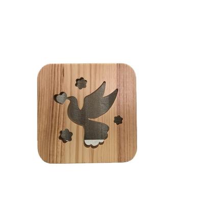 China Lighting Roll Above Picture To Zoom In Creative Wood 3D Bird Pattern Night Light Carved Wooden Desk Lamp for sale