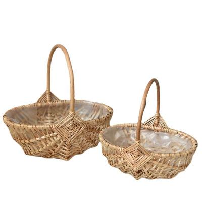 China China Manufacturer Handmade Flower Willow Storage Gift Baskets With Waterproof Coating for sale