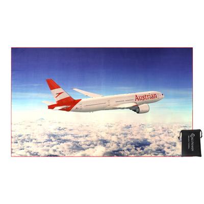 China Compressed Made In China Double Side Printed Towels Microfiber Airplane Airplane Super Warm Dry Compressed Towel With Mesh Bag for sale