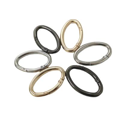 China Kirsite Spring Ring Wholesale Bag Metal Spring O Ring Small Spring Hook Key Oval Ring for sale