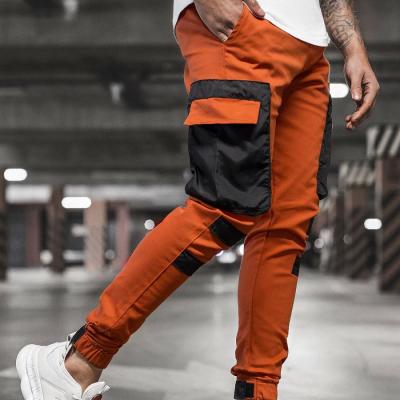 China Anti-Wrinkle Men Pocket Patchwork Joggers Cargo Pants Streetwear Long Track Pants Men for sale