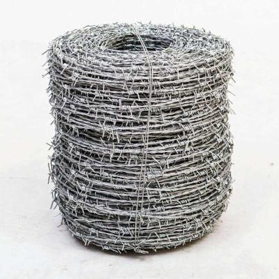 China Factory Price Farmhouse Razor Barb Wire Galvanized Barbed Wire Garden Screen Barrier Green Silver Surface for sale