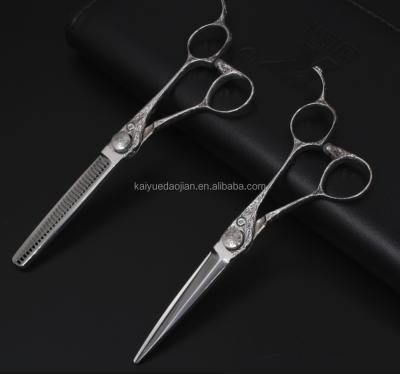 China Thinning scissors 0609 hair salon scissors with engraved handle and screw for sale