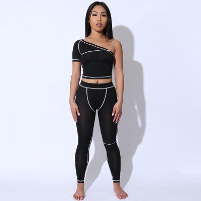 China New Arrivals Fashionable Breathable Colorblock Mujer Women Teams Streetwear Gaiters One Shoulder Contrast Lady Two Piece Pants Set for sale