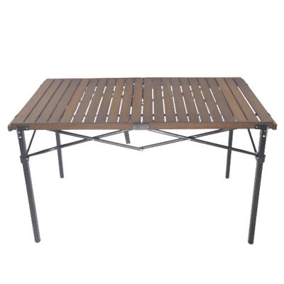 China Light Weight Modern Folding Portable Outdoor Folding Top Wooden Roll Up Picnic Camping Table for sale