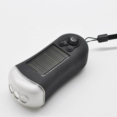 China Camper Hunting Rechargeable Solar Bike 3 LED Radio Flashlight FM Torch for sale