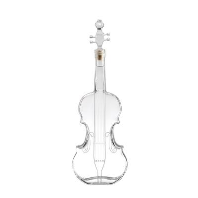 China Wish Handcraft Borosilicate Glass Violin Shaped Fancy Glass Wine Bottles Whiskey Bottle for sale