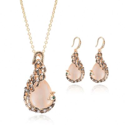 China 2022 CLASSICS new 0207 gifts peacock shape pink gemstone jewelry sets gold plated rhinestone party jewelry set for sale