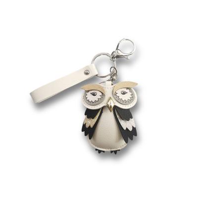 China 2023 New Explosive Personality Owl Backpack Leather Key Chain Hanging Ornaments for sale