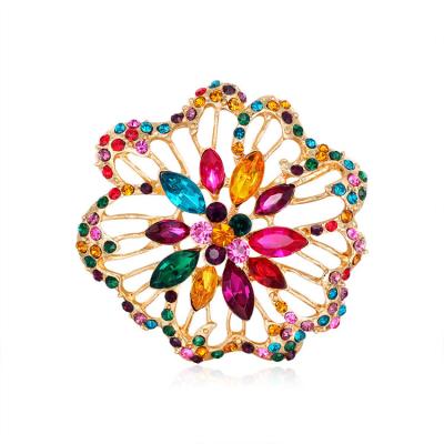 China Wholesale Korean Luxury Fashion Color Rhinestone Brooch Designer Alloy Hollow Flower Brooch For Women Wedding for sale