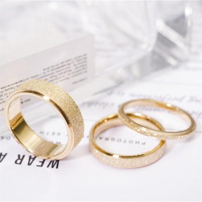 China Vintage 14K Gold Ring Fashion Shiny Gold Plating Stainless Steel Wedding Ring for sale