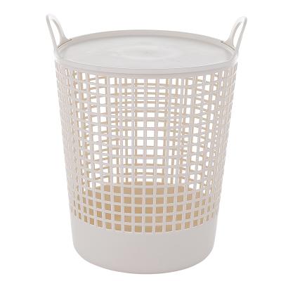 China Unbreakable Round Plastic Handles Bathroom Handle Basket For Laundry for sale