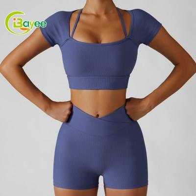 China Breathable Women Seamless Short Sleeves Yoga Set 2022 Gym Fitness Workout Shorts Sets 2 Piece Padded Yoga Set Ribbed Shorts for sale