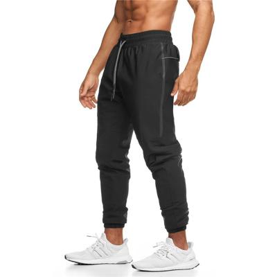 China Breathable Custom Mens Hide Design Clean Logo String Sweatpants Narrow Foot Cargo Stacked Full Fitness Jogging Zipper Side Pocket Pants Men for sale