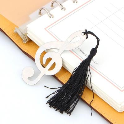 China Wedding Party Return Gifts Hollow Musical Notes Bookmarks Metal With Mini Greeting Cards Tassels Pendant Gifts Stainless Steel Wedding Favors for sale