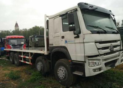 China 8x4 lage Flatbed Vrachtwagen, de Op zwaar werk berekende Flatbed Transmissie van de Platformvrachtwagen HW19710 Te koop