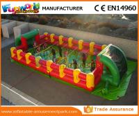 China PVC Tarpaulin Orange Inflatable Football Field Blow Up Football Game Equipment for sale