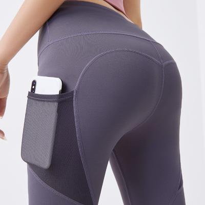 China Dropshipping TikTok Breathable Yoga Pants With Pockets For Women Fitness Women Seamless Gaiters Elastic Waist Lift Up Higher Waist for sale