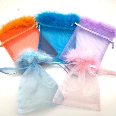 China Wholesale Pink Furry Gift Pouch Furry Drawstring Jewelry Bag Custom Organza Feather Organza Bags With Fur for sale