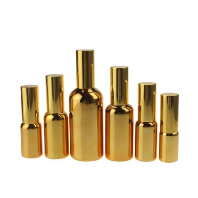 China Personal Care 100ml High Grade Gold Glass Body Lotion Bottle Wholesale, 100ml Glass Spray Pump Bottles For Lotion, Custom Lotion Bottles for sale