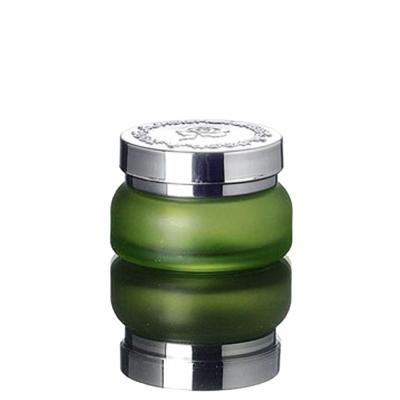 China Personal care wholesale 50G green glass cream jar with silver lid, 50g green gel glass cosmetic container, wholesale 50g glass cosmetic jar for sale