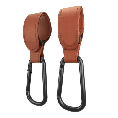 China Eco-Friendly Factory Brown Leather Stroller Hooks By Baby Stroller Clip Clips For Wheelchair Stroller Trolley Hook Bag Accessory for sale