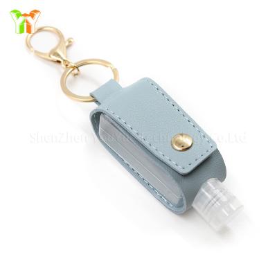 China Portable Household Hand Squeeze Bottle Key Chain Holder Set Travel Empty Bottles Hand Sanitizer Container for sale