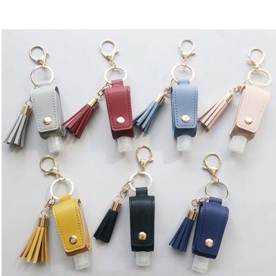 China Household Hand Sanitizer Storage Holder Pocket Pouch Case Tassel Key Chain With Bottle for sale