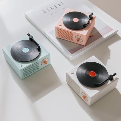 China Creative Portable Small Speakers Box Mini Music Sound Home Small Audio Wireless Atomic Vinyl Record Player Retro Speaker Gift for sale